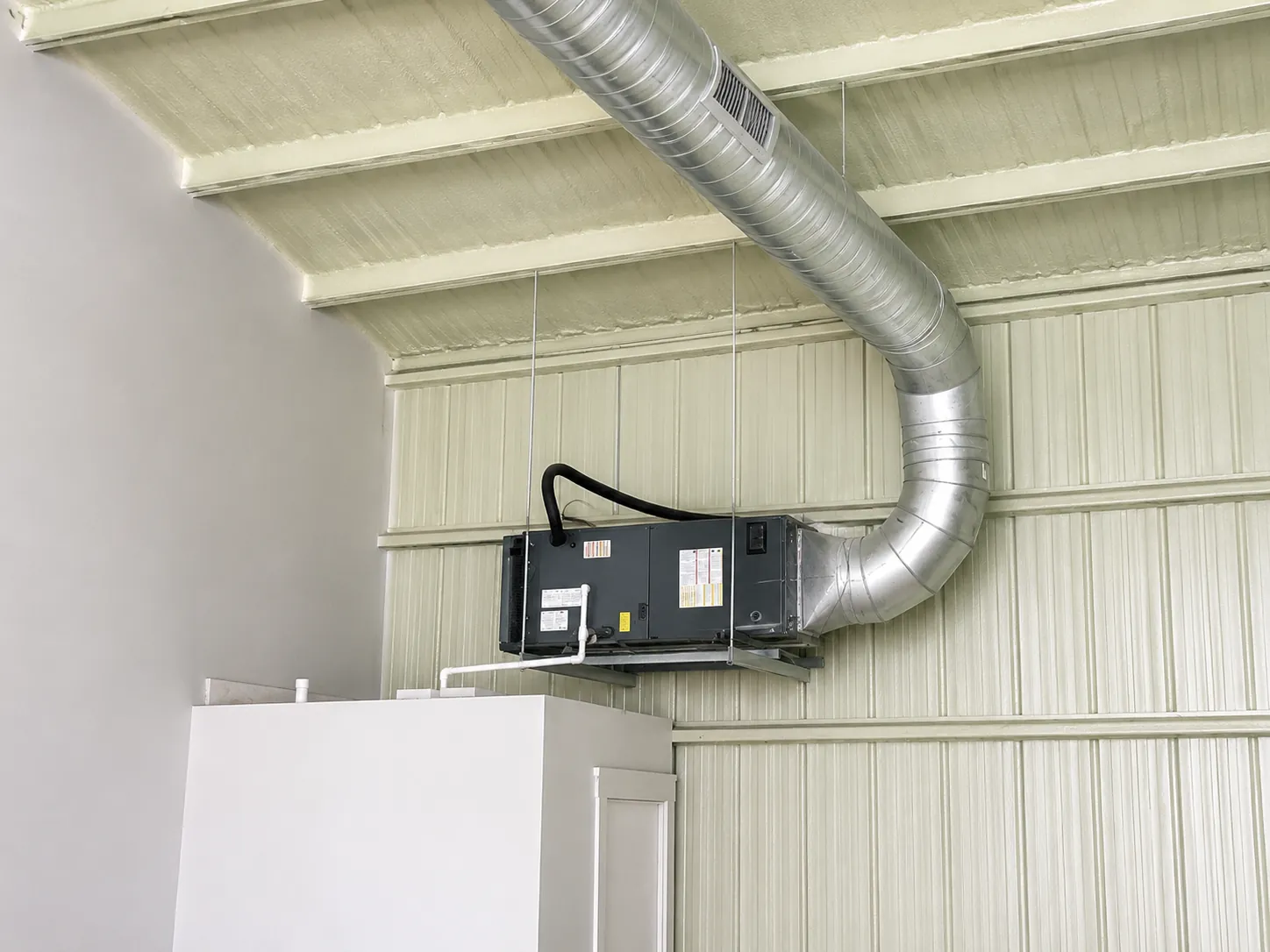 Air handler and spiral ductwork installation in metal building by Cool Rescue 1 Heating and Air in Caddo Mills TX