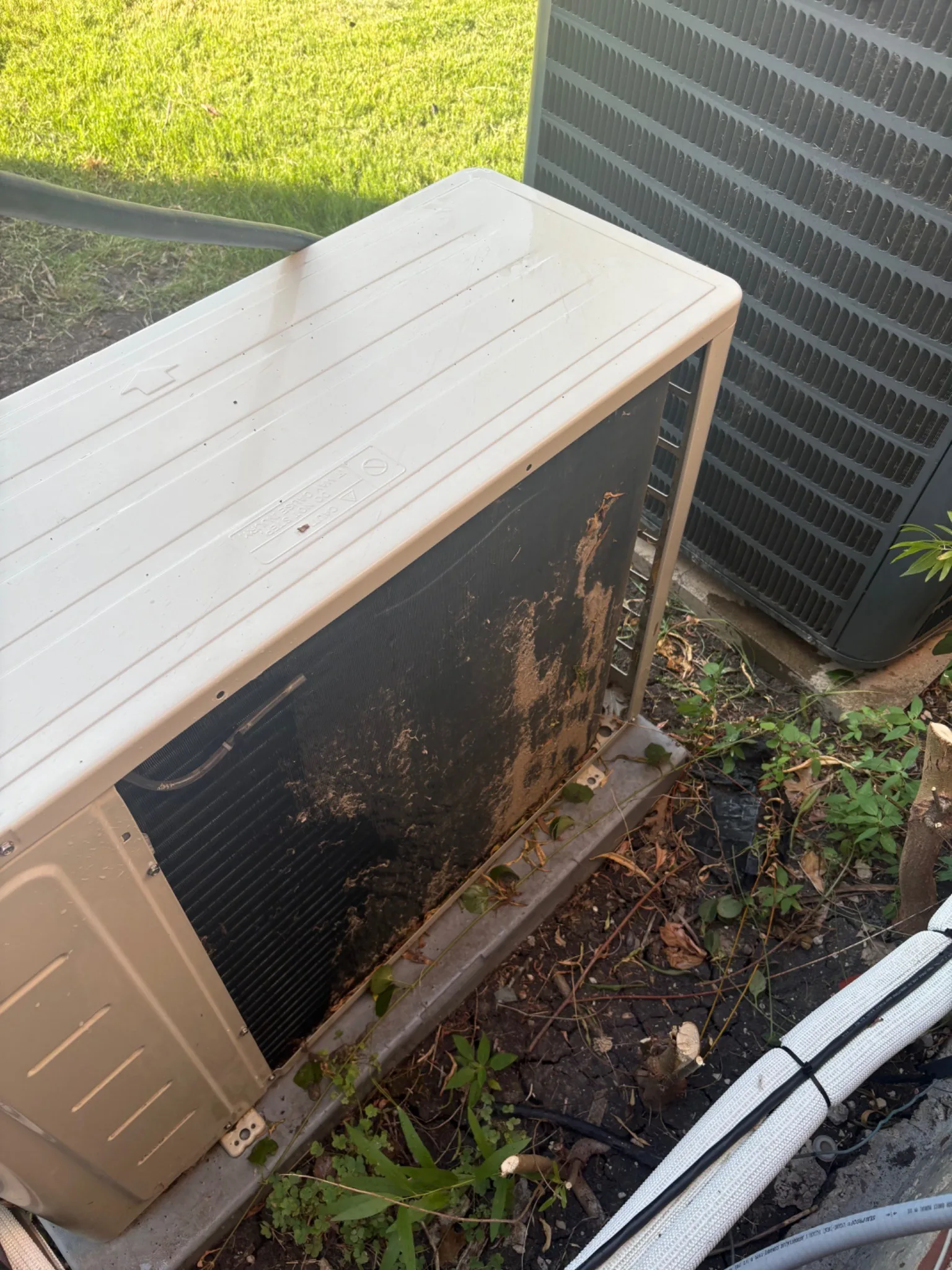 Mini Split Maintenance In Caddo Mills, TX Dirty mini split outdoor condenser needing maintenance service in Caddo Mills, TX